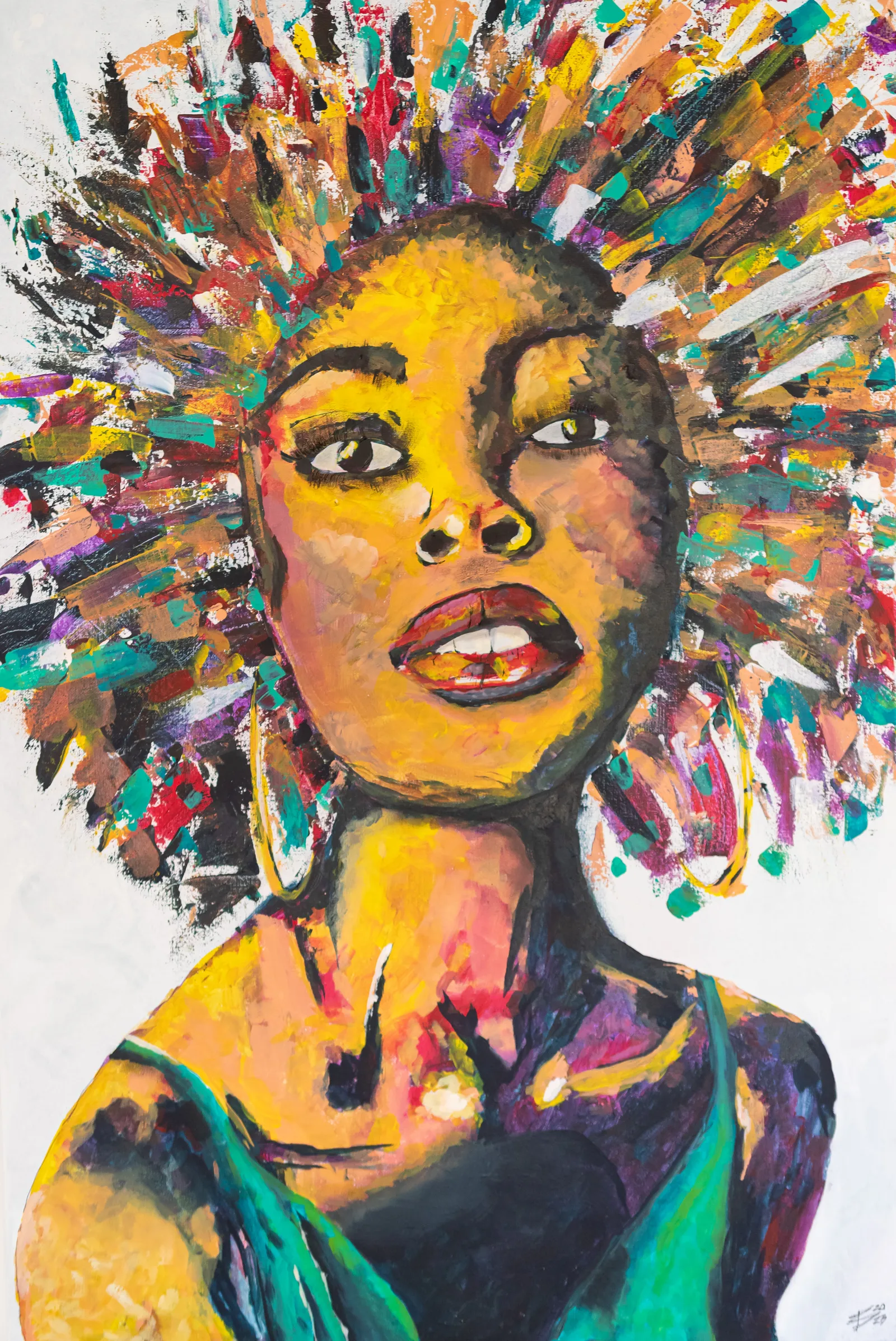 Woman with a large halo of multicoloured brush-stroke hair, gold hoop earrings and a green top, on white